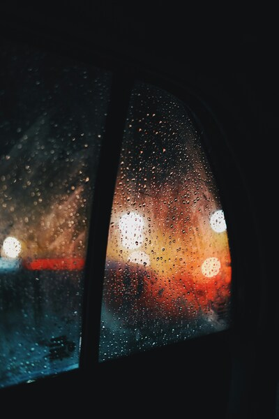 • Rainy Night View from a Car Window – Aesthetic 4K Wallpaper – HD Background