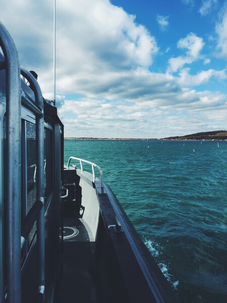 • 60-70 characters maximum • ‘Large White and Blue Boat on Blue Water w